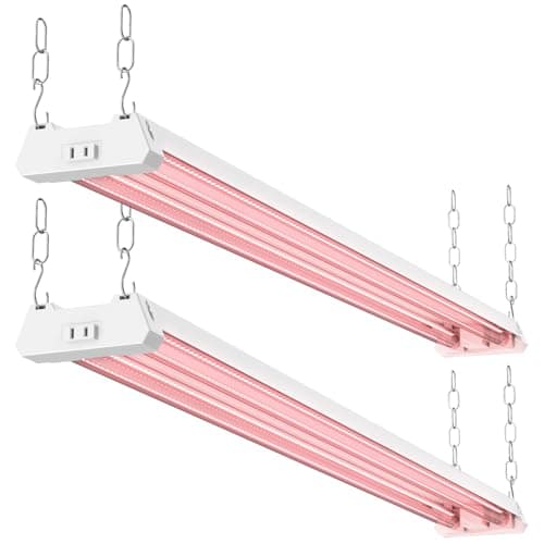A slim 4 ft LED grow light strip mounted beneath a shelf above seedling trays